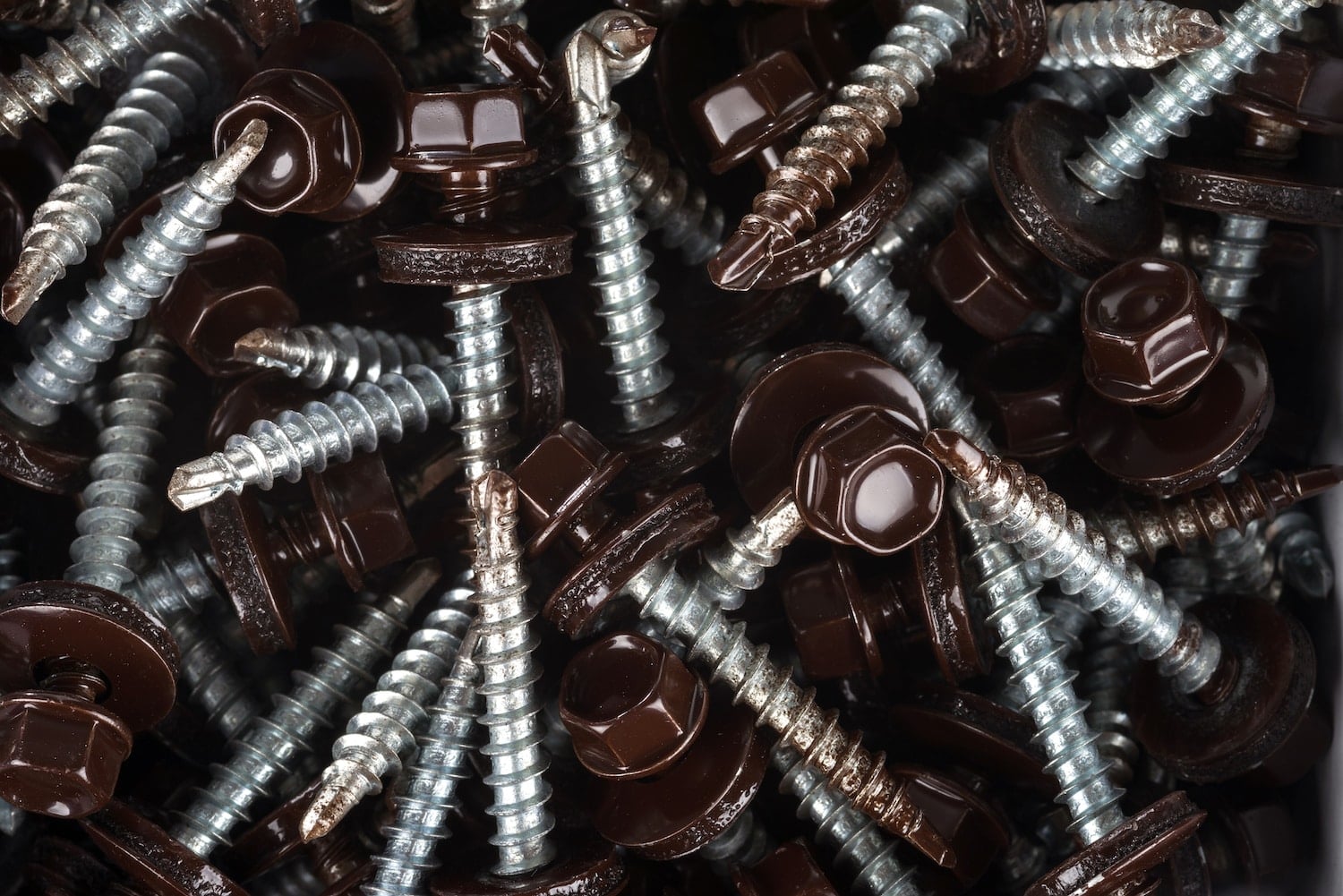 Self-tapping screws for fixing the roof with brown hex heads. metal roof screw pattern