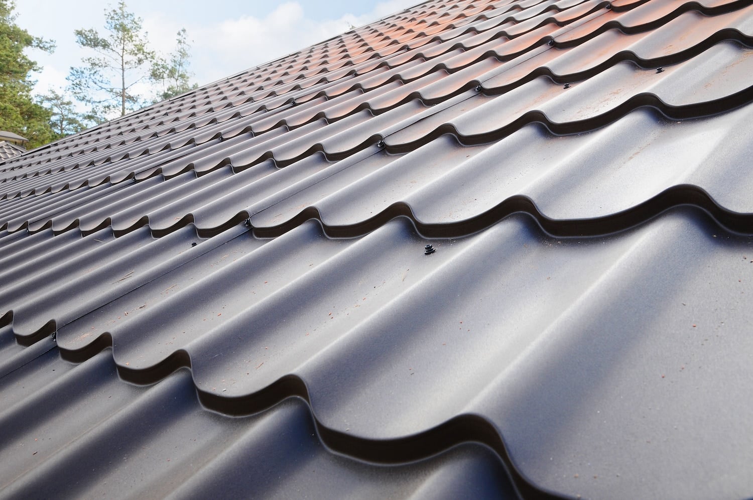 Roofing materials. Metal House roof. Closeup House Construction Building Materials. Roof construction. metal roof over shingles problems close up of metal roof