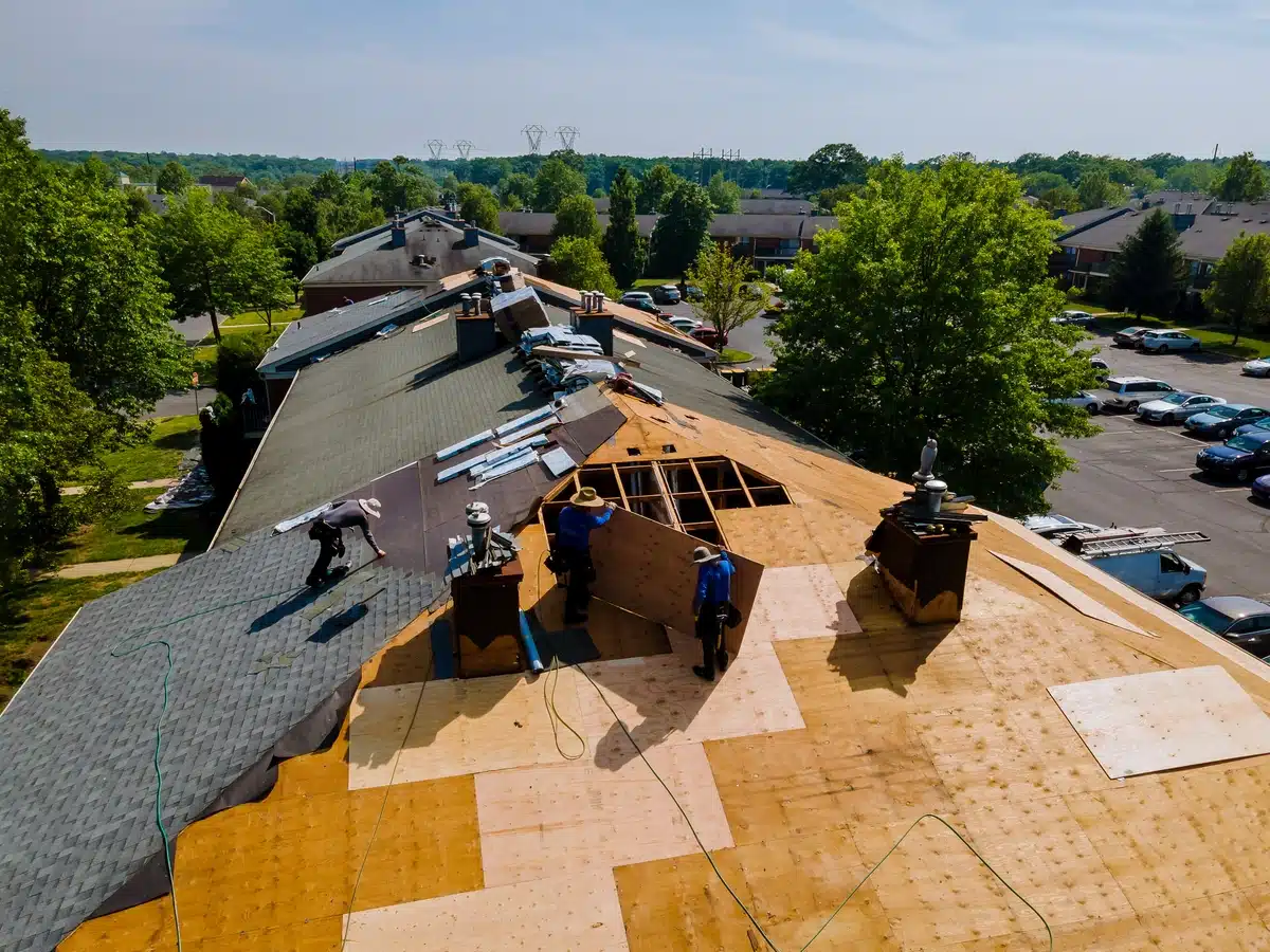 arial view of contractors replacing new roof