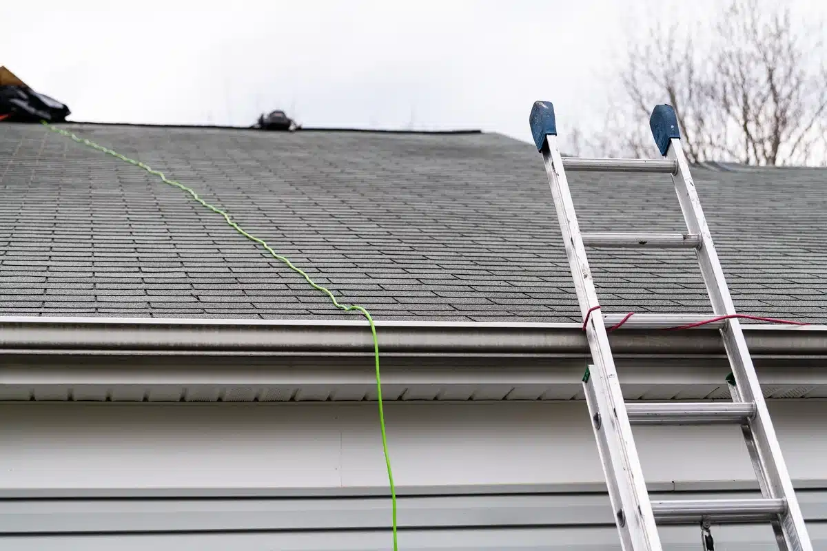 unreliable inspection roof scam close up of ladder leading to rooftop during inspection and possible roof scam