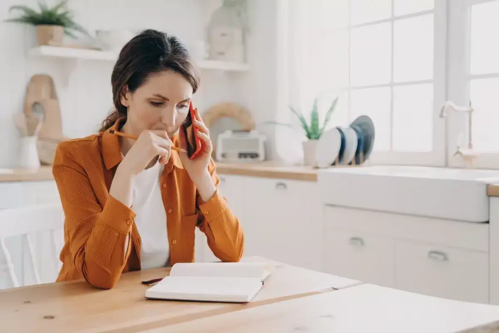 woman on the phone asking questions to the contractors