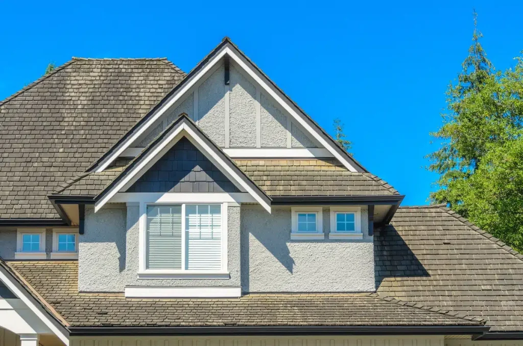 old house roof requires repair on damaged shingles