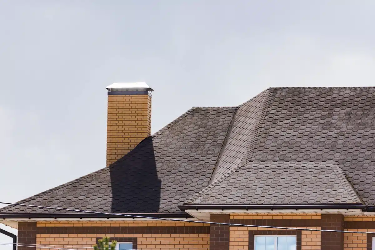 house roof and chimney close up to house roof and chimney