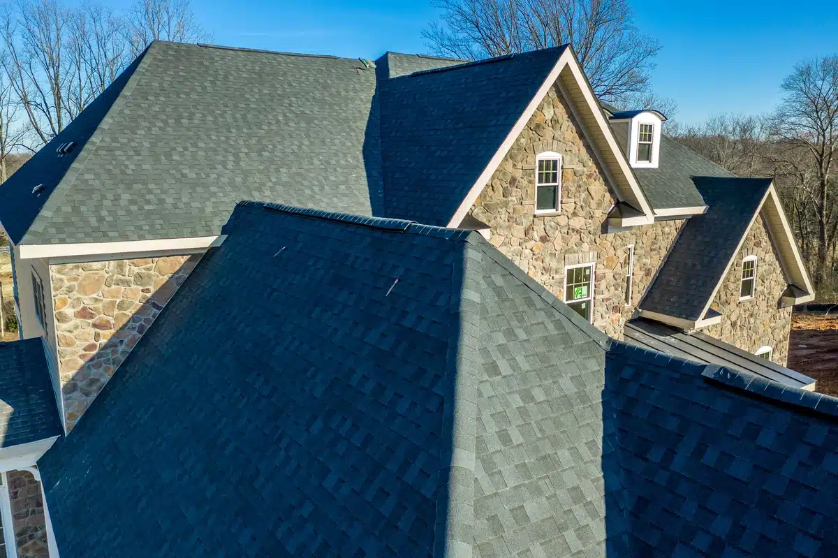 beautiful new house and large asphalt shingle roof