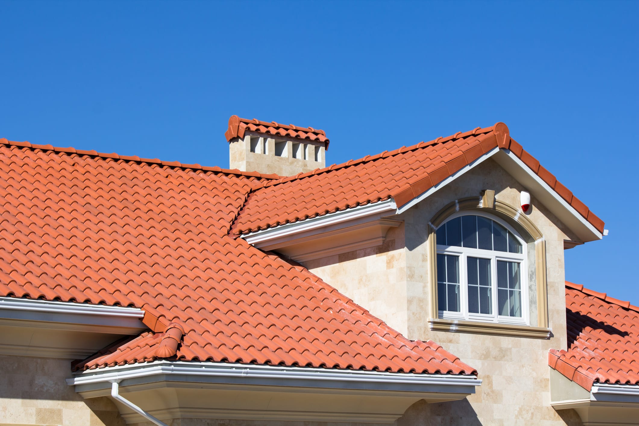 Home with a durable tile roofing system