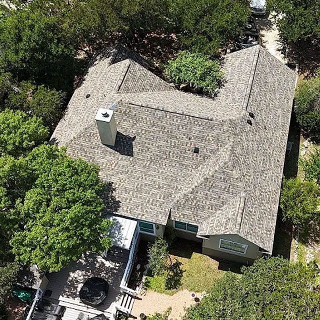 Overhead view of a light shingle roof
