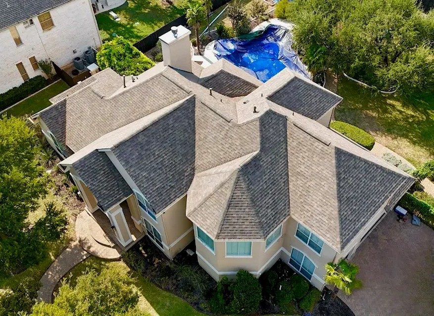 Aerial view of a shingle roofing project